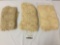 Three doiley/lace type ornamental table clothes, largest approx. 80x55 inches.