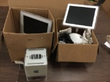 Collection of early 200s Mac Computers G4 Cube, 4th Dimension computer, and accessories.