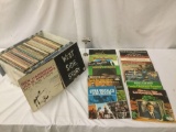 Over one hundred records, mostly Christmas music and some musicals, approx. 16x22x12 inches.