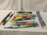 Twelve rolls of soft and polymer fabrics, approx. 36x6x6 inches.