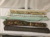 Four rolls of soft fabric and two rolls of coarse fabric, approx. 67x4x4 inches.