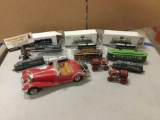 Collection of Model trains and cars, Desire St. street car, Southern Pacific, and more.
