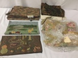 Decorative tapestries, heavy fabrics and a furniture cover, approx. 17x16x5 inches.