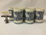Six hand painted Dutch Delft Blue steins, approx. 5x4x5 inches each.