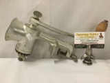 Vintage Universal meat grinder with clamp, approx. 12x11x4 inches.