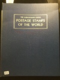 The Ambassador international Postage stamp album w/ hundreds of stamps, see pics