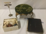 Two antique billiard balls, a small ottoman, and an antique hand written cook book, approx. 12x9x11