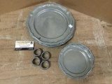 Collection of 8 vintage Crown Castle LTD pewter plates and 4 pewter napkin rings, made in USA.
