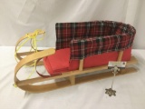 Canadian OneStepAhead plaid lined sled, approx. 34x14x13 inches.