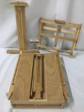 Portable wooden art easel, has some paint stains, approx. 22x17x5 inches.
