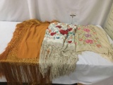 Three soft fabric table cloths with long fringes, approx. 50x48 inches.