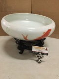 Hand painted Japanese porcelain bowl on a stand with koi fish motif.