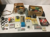 Large lot of camera gear. Revere 8mm Camera, lenses, filters, memory card, etc see pics