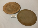 Lot of 2 pizza stones; 1 marked The Pampered Chef - Family Heritage Collection, approx 16 inches