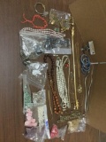 Large lot of estate costume jewelry and buttons.