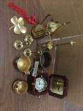Collection of brass pieces, NNSA award, karafe, candle holders and more.