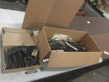 Large collection of HO scale train tracks, transformer and control, and more.