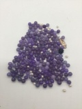 Collection of amethyst beads, pearls, and more. Weighs 167 grams. The beads measure 7.5mm