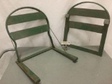 Pair of green vintage metal bleacher seats, approx. 17x20x4 inches each.