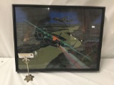 Fighter plane print in wood frame.