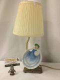 Vintage lamp w/ blue dancer figure on base, tested and working, approx. 8x7x17 inches.