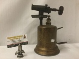 Vintage blowtorch with obscured makers mark, approx. 19x6x10 inches.