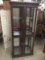 Modern lighted curio cabinet with glass shelves - good cond