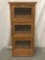 Wooden three door onion cabinet w/three removable wooden trays