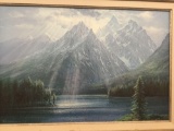 Canvas print of a lake and mountain scene with light shining through the clouds by Peter Ellenshaw