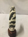 Alaskan Inuit PNW scrimshaw whale tooth depicting a whale scene by artist Rashidi (signed)