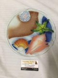 PNW Pulegoso art glass plate featuring a seashell beach scene