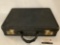 Vintage Corbin briefcase with keyless locks, shows wear, approx 19x18x4 inches.