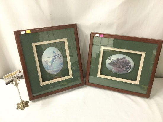 A pair of framed "ducks in flight" artworks by unknown artist - image on canvas