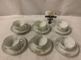 Set of 12 pieces of Royal Q and EG - Austrian porcelain tea cup and saucer sets, minor chips