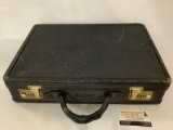 Vintage Corbin briefcase with keyless locks, shows wear, approx 19x18x4 inches.