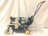 Vintage Taylor-Tot baby stroller with some general wear