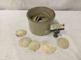 Collection of sand dollars in vintage stoneware crock. Crock measures approx 7.5x7.5x5 inches