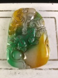 Multi colored large jadeite pendant w/ carving of mouse climbing fruit plant approx 3x2 inches