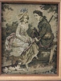 Woven framed tapestry of courtship scene.