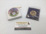 Disney 20 year anniversary coin and pendent.