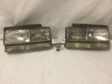 Pair of untested GM 1991-1996 Park Avenue Headlights/Parking Lights No.16512991.