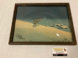 Antique framed print of a wolf in the snow overlooking small village, approximately 17 x 13 inches.