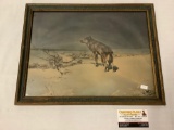 Antique framed print of a wolf in the snow overlooking small village, approximately 17 x 14 inches.