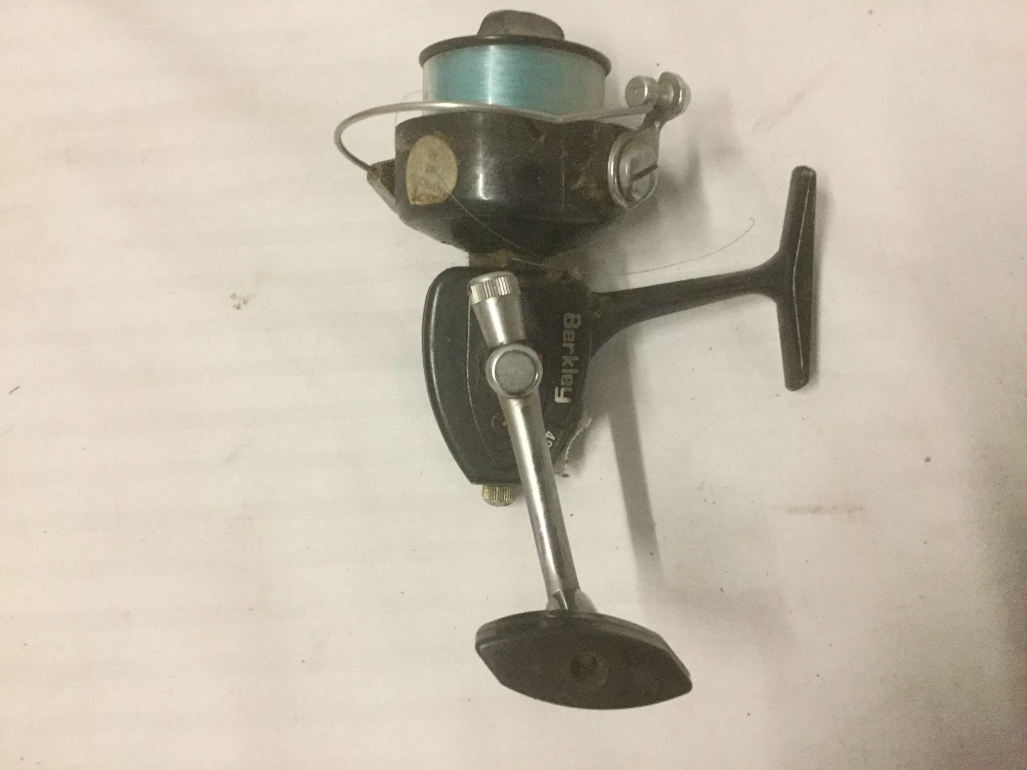 calypso salmon run fishing pole Four fishing reels, incl. a Calypso Salmon Run