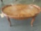 Vintage wood carved coffee table with intricate floral inlaid wood design, approx 37 x 21 x 17