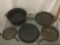 Three cast iron skillets and a Cabelas cast iron Dutch oven