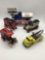 Four diecast toy car coin banks and one diecast replica tow truck. Incl. a 1991 Crown replica 1931