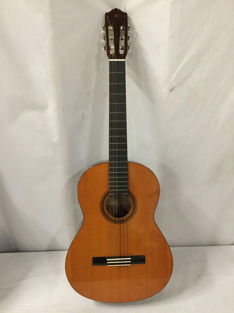 Yamaha CG-100 nylon string classical guitar with hard case and Korg At-12  tuner. Case measures | Art, Antiques & Collectibles Collectibles | Online  Auctions | Proxibid