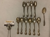 Lot of 11 sterling silver spoons; combined weight 220 grams.