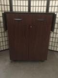 Modern one drawer cabinet w/two drop leaves and casters, approx. 57x21x40 inches with leaves